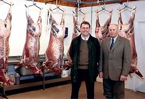 Harry Coates is pictured left in Balmoral Estate's game larder with head gamekeeper Ben Fernie