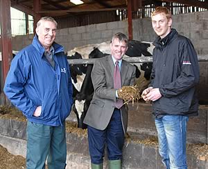 Harry, left, and David Hodgson assess the TMR with Carrs Billington nutritionist Gareth Brolly, centre.