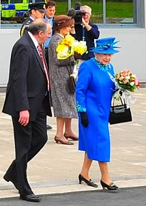 he Queen accompanied by John Jones