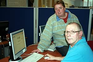 Barry Dobson showing Gordon Jones of UTASS