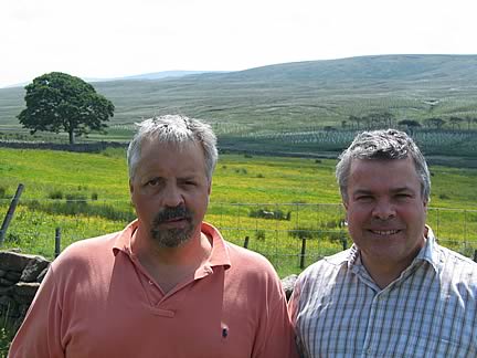 Swarthghyll Farm owner John Hart (left) and Senior Trees and Woodland Officer Geoff Garrett with the winning woodland scheme behind them. Please credit photo courtesy of the Yorkshire Dales National Park Authority.